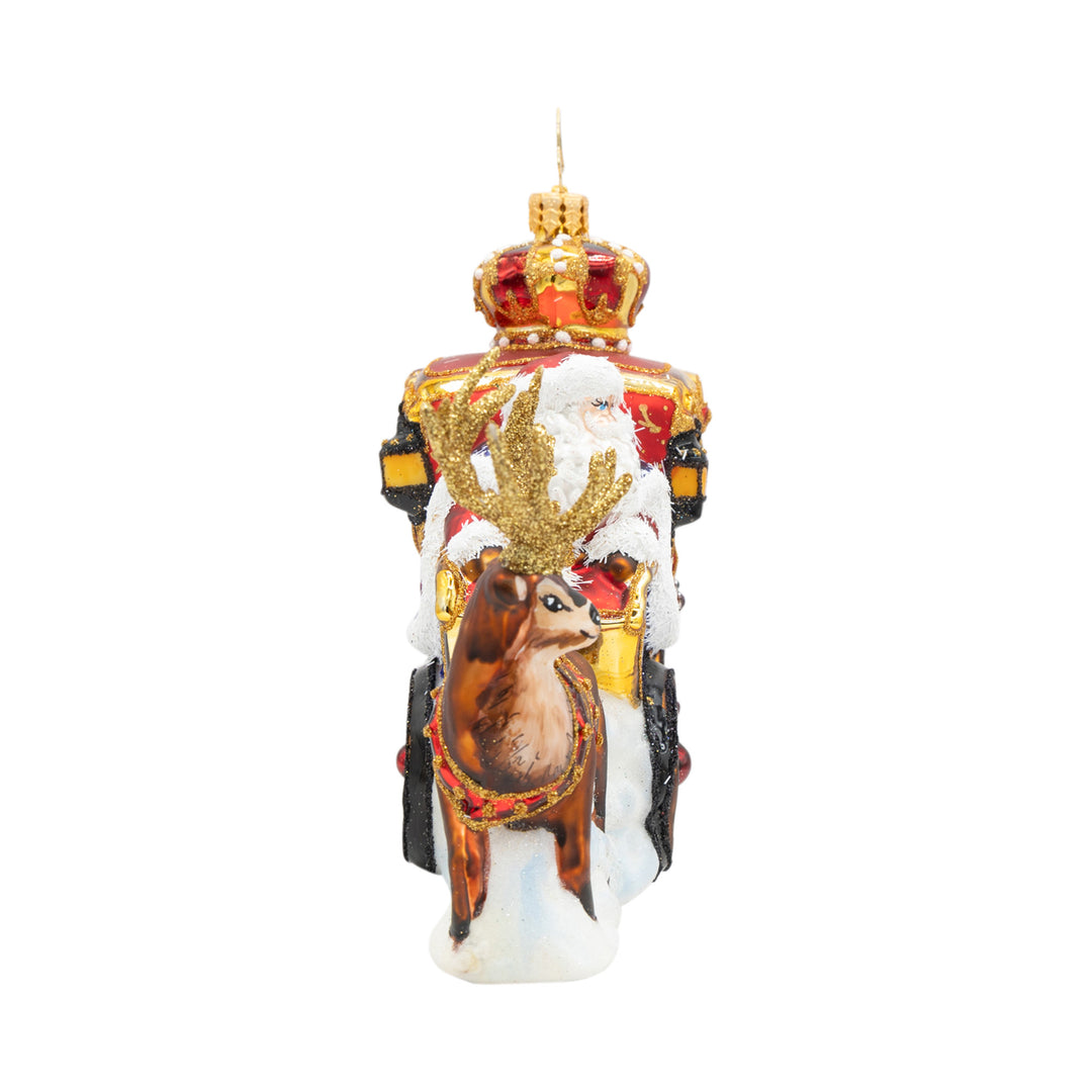 Yuletide Carriage Ride glass ornament featuring Santa in a gold-trimmed carriage with a reindeer.