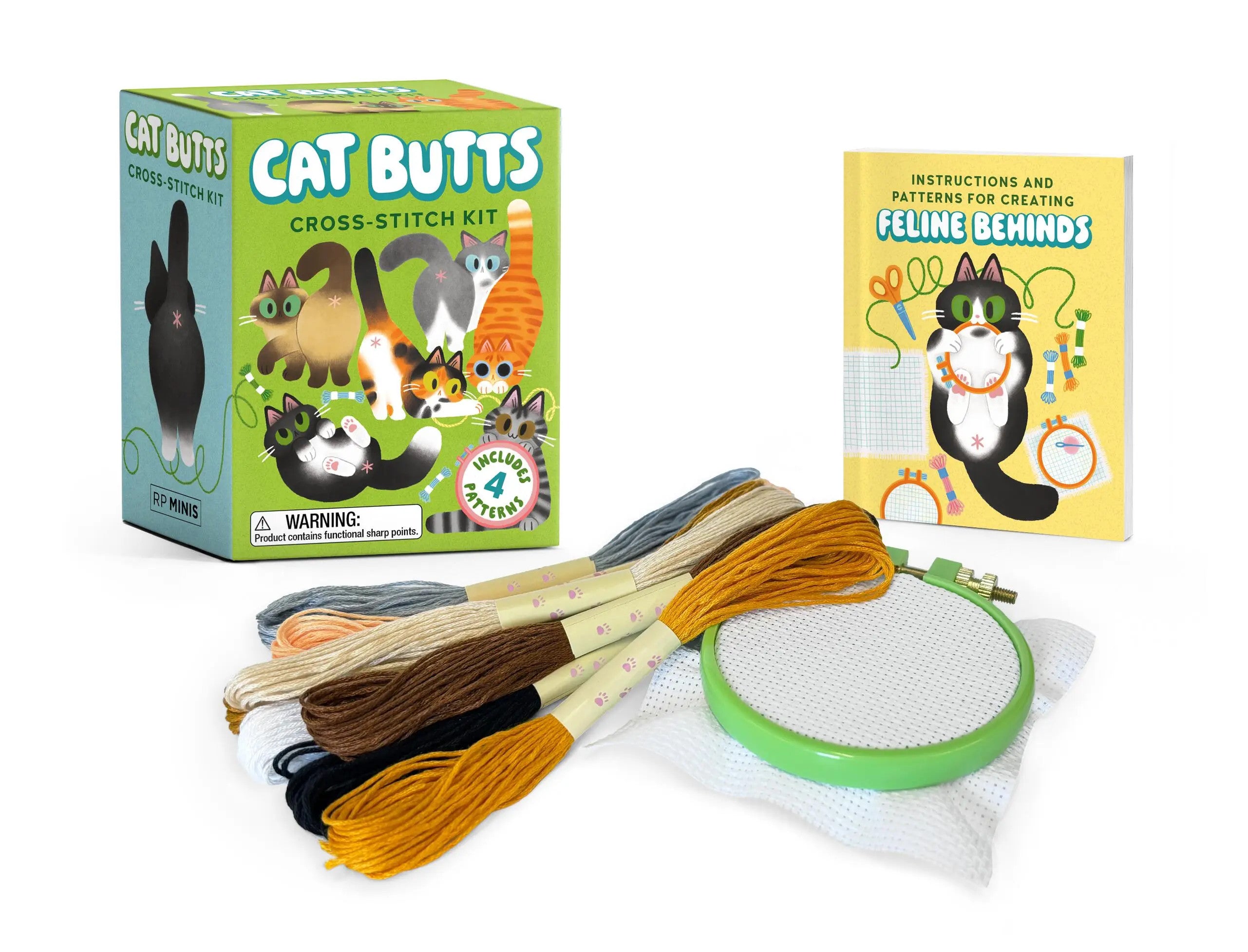 Cat Butts Cross-Stitch Kit featuring a black fabric with white cat silhouette patterns and embroidery floss.