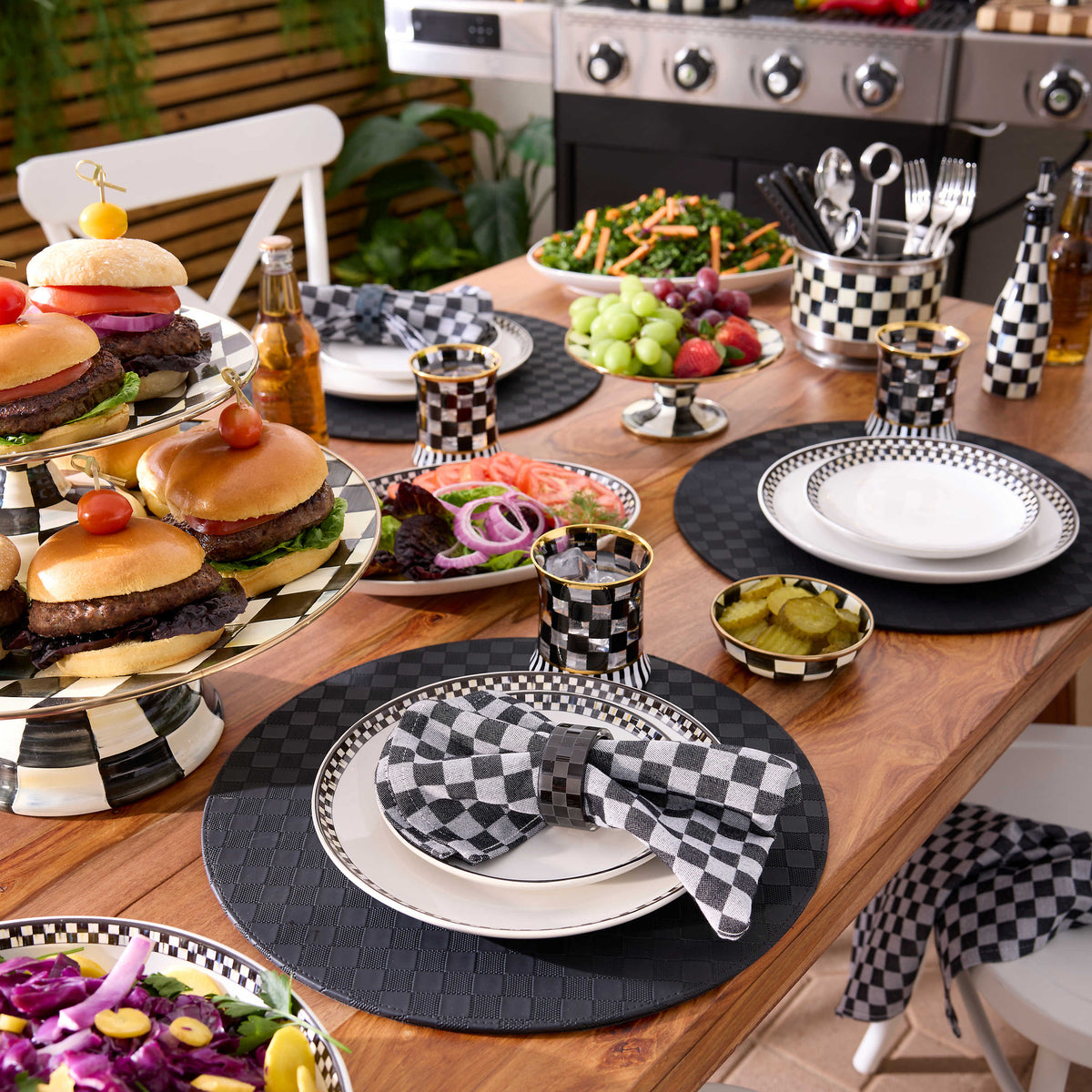 Courtly Check Everyday Lunch Plate on a set table with burgers, salads, and checkered accessories.