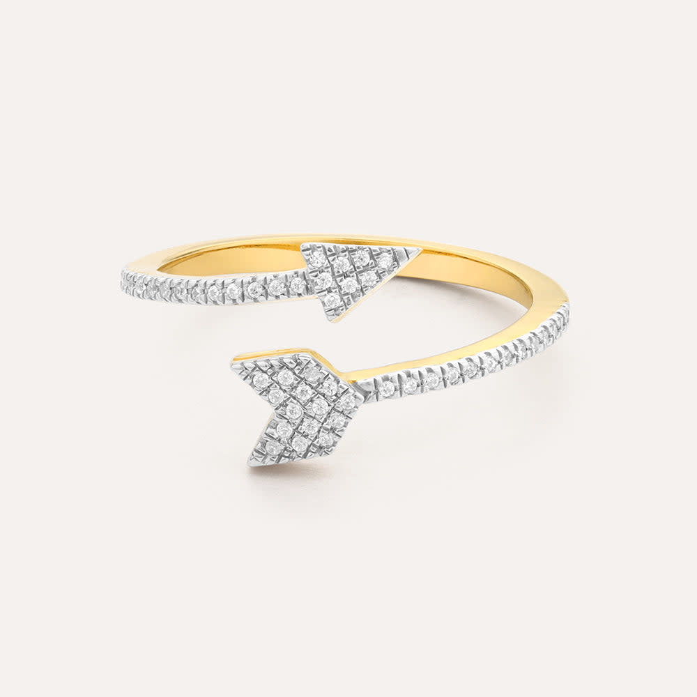 Sterling silver statement ring with a diamond arrow pointing upward on a gold-plated band.