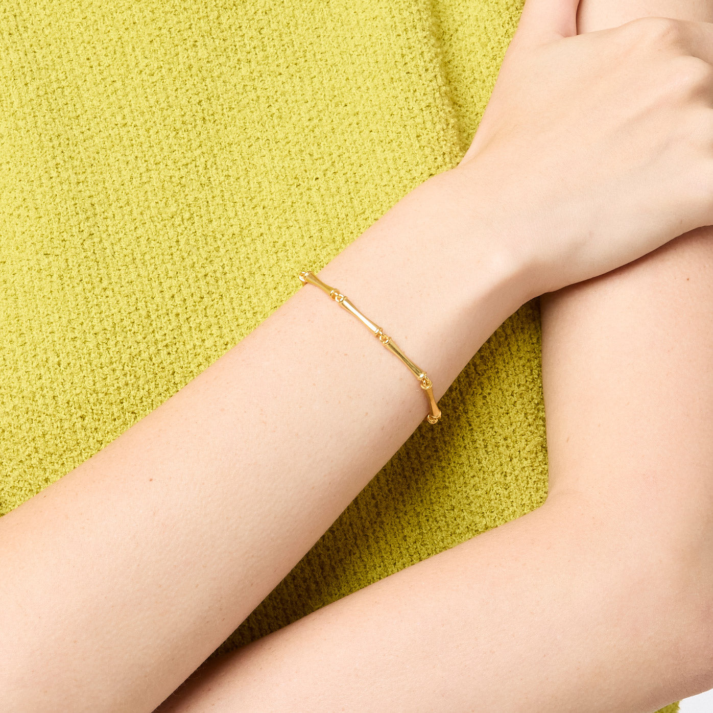 Adjustable bamboo bracelet with toggle clasp featuring a Julie Vos hallmark.