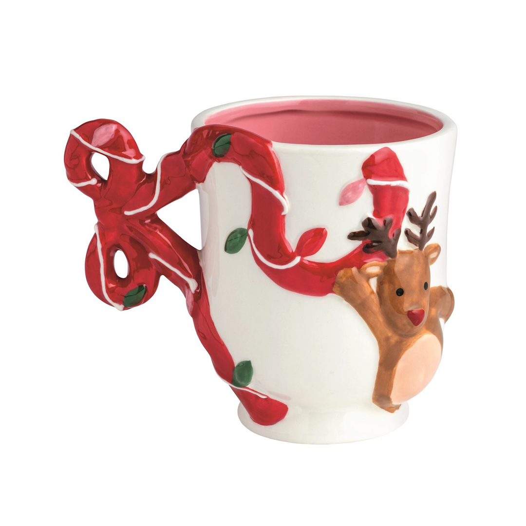 Hand-painted 15 oz ceramic Christmas mug with a red bow handle and a raised reindeer design.