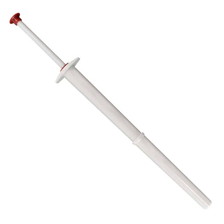 White plastic pickle picker tool with a red plunger button and four-prong grabbing mechanism.