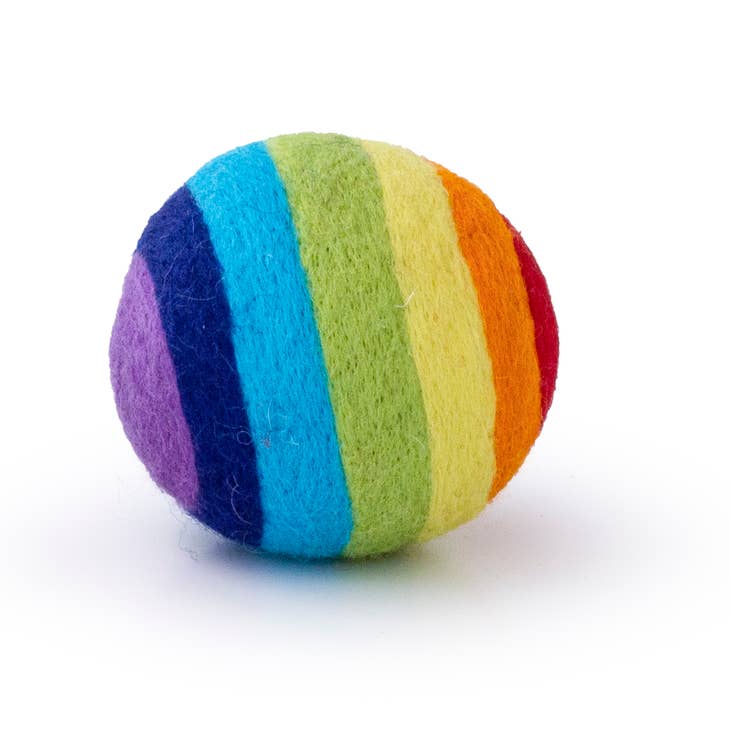 Single white eco dryer ball with a smooth spherical shape.