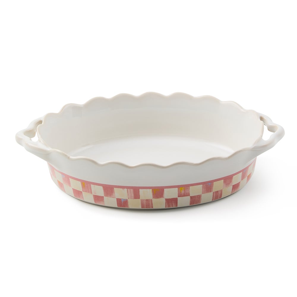 Oval stoneware baker with a handle in natural earth tones