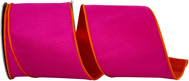Fuchsia and orange reversible dupioni wired edge ribbon on a spool.