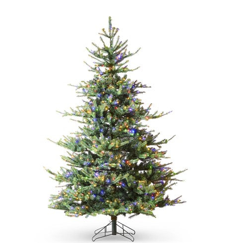 Nine-foot green PVC artificial spruce tree with hinged sections and warm white LED lights.