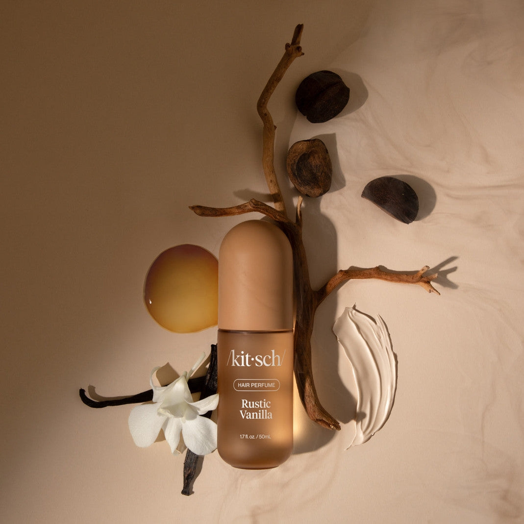 Bottle of Rustic Vanilla Hair Perfume with a pump dispenser