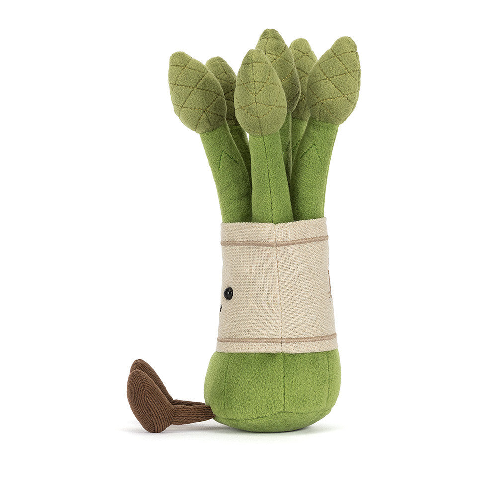 Amuseables Asparagus plush toy featuring a bundle of green stalks with a smiling face and brown feet.
