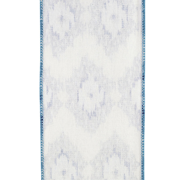 4 inch white canvas wired edge ribbon with a blue ikat pattern.