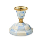 Mackenzie Childs short candlestick with blue and white hand-painted checks and brass accents.