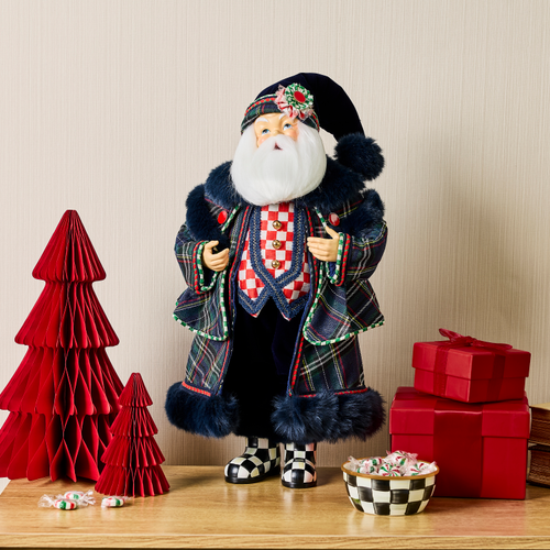 Timeless Tartan Fabric Santa figurine in a plaid coat and checkered vest with holiday decor.