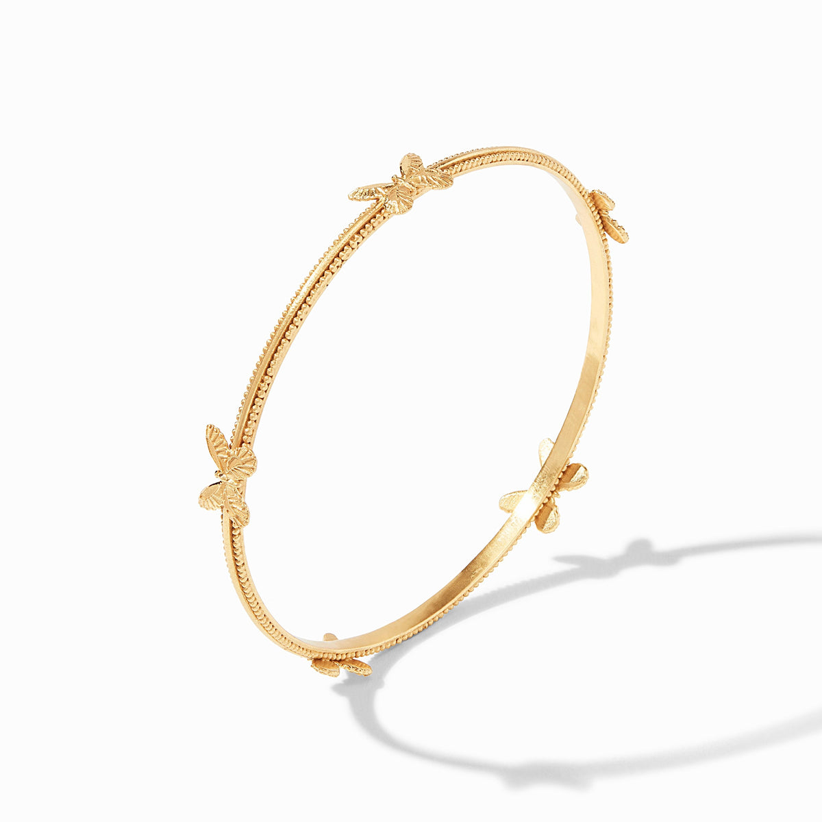 Butterfly bangle bracelet with gold-tone finish featuring a delicate butterfly silhouette.