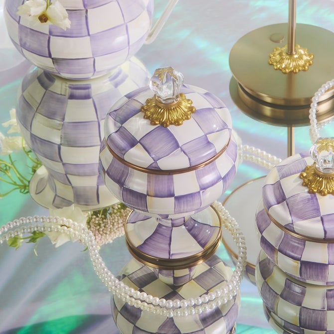 Violet checkered ceramic curiosity pot with a curved handle