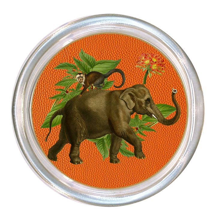 Glass coaster with a high rim to prevent spills, featuring black velvet backing.