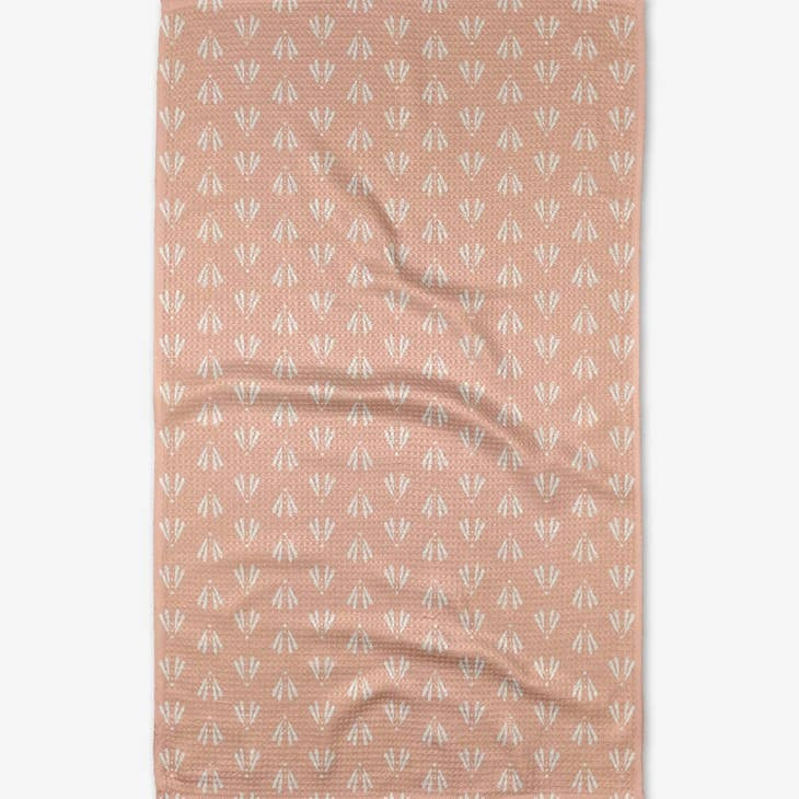 Recycled polyester tea towel with moth geometric print in waffle weave construction