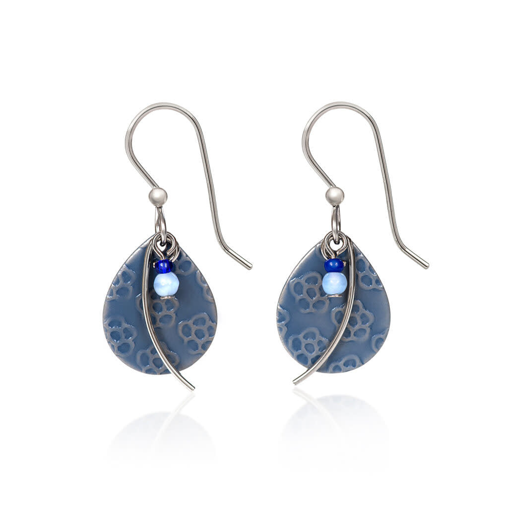 Silver-tone textured tear earring with a delicate flower and metal wisp charm.