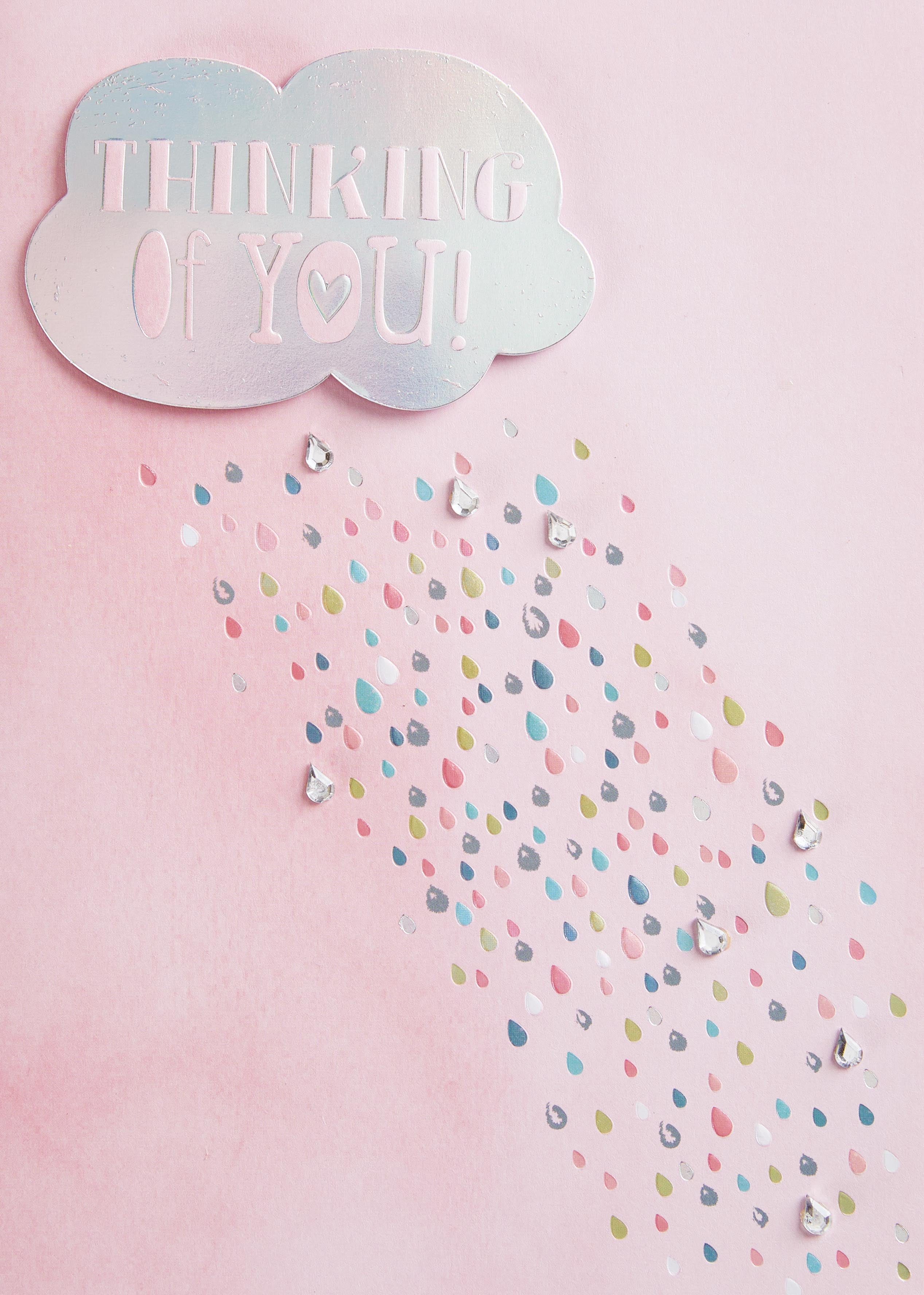 Cloud-shaped card with "Thinking Of You" text and colorful raindrop embellishments on a pink background.
