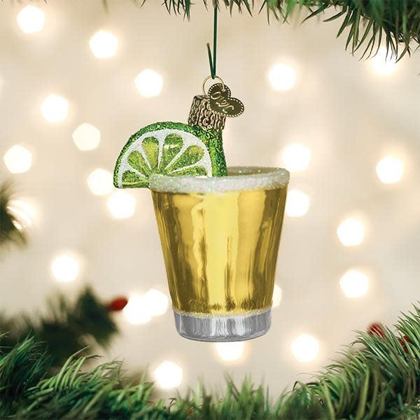 Tequila shot glass ornament with salt rim, lime slice detail, and festive holiday silhouette.