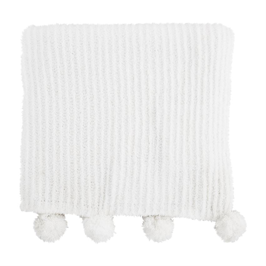 Chenille pom blanket in soft beige with a textured looped pile surface.