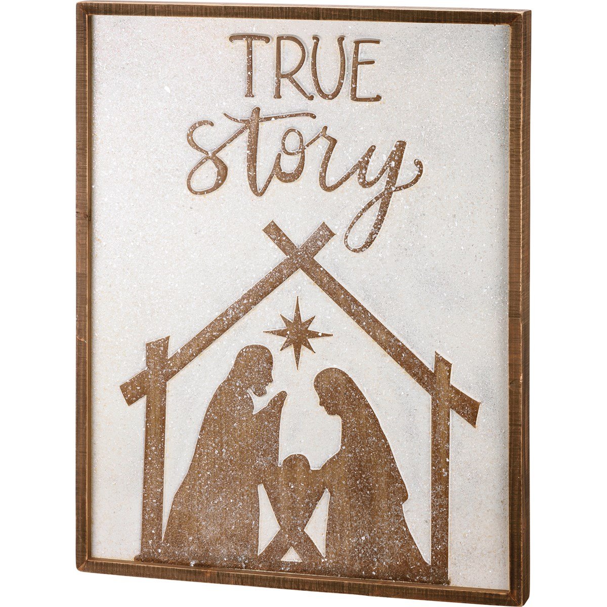 Inset box sign with 'True Story' text and a glittery nativity scene silhouette in a wooden frame.