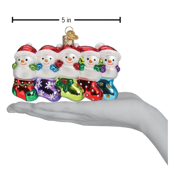 Snow Family of 5 glass ornament featuring five snowmen in colorful stockings, 5 inches long.