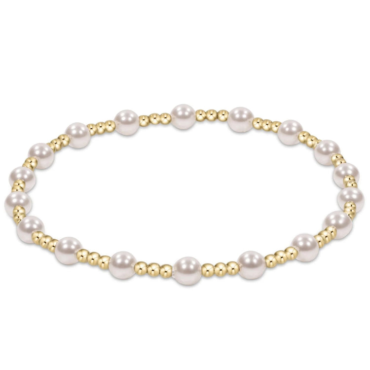Extends Sincerity bracelet featuring alternating 4mm crystal pearls and 2mm gold-filled beads on stretch elastic.