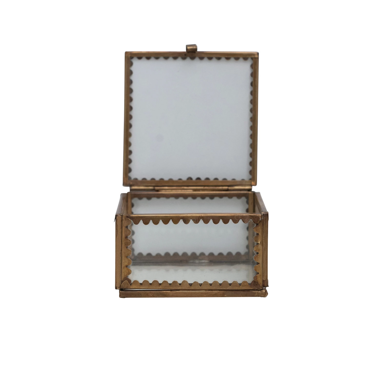 Small square brass and glass display box with scalloped metal edges and an open lid.
