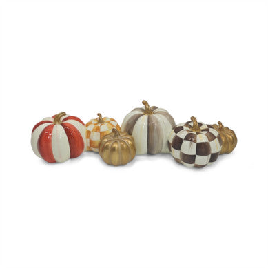 Harvest Glow Pumpkin Cluster: a cluster-shaped candle with an amber glass jar featuring pumpkin and leaf motifs.