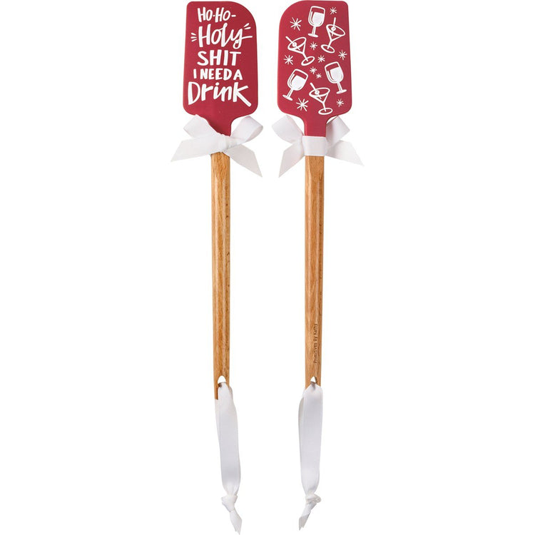 Wood-handled silicone spatula with red Christmas-themed head.