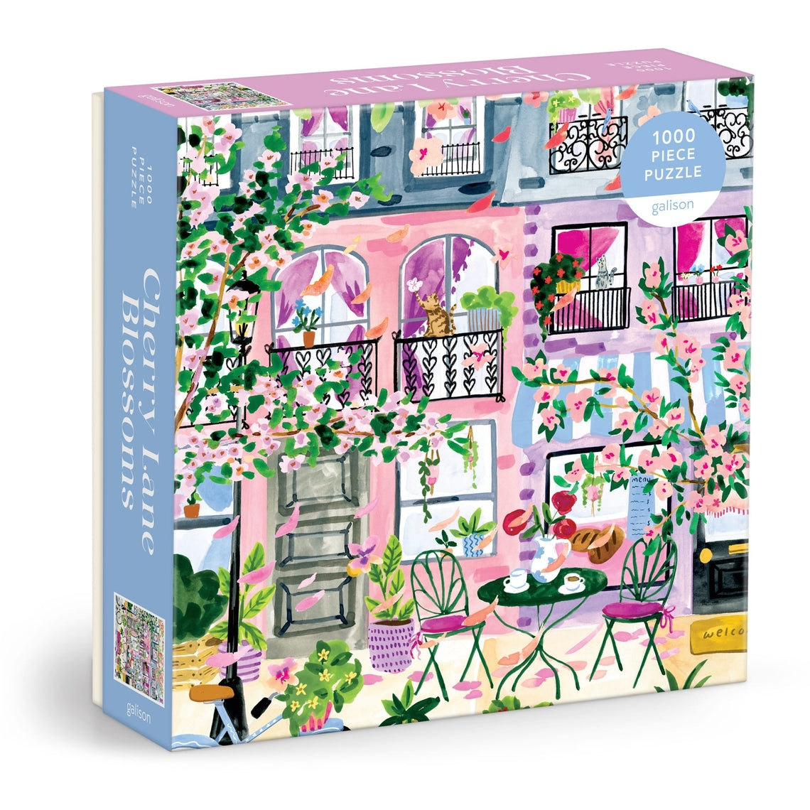 Cherry Lane Blossoms puzzle box featuring colorful houses beneath a canopy of pink cherry blossoms.