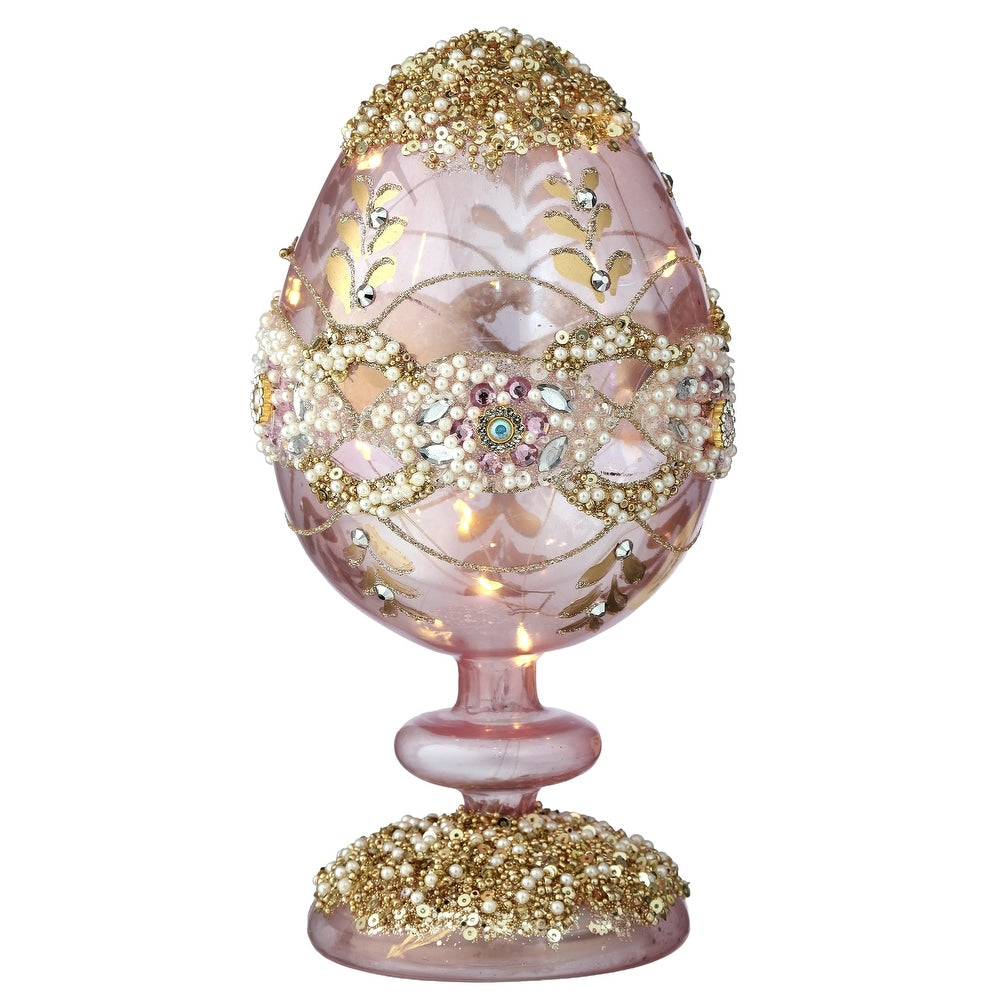 8-inch glass LED egg pedestal with warm white lights and sparkling jewel accents on a faceted surface.