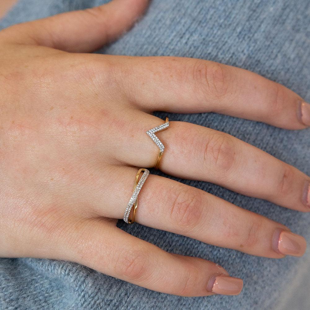 Crisscross stackable ring in gold-plated sterling silver with a diamond weight of 0.10 carats.