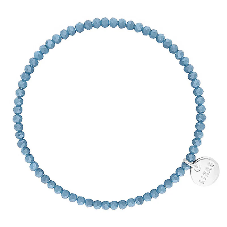 Lizas Quadro Big Bright Colours stretch bracelet with faceted blue crystal beads and silver charm.