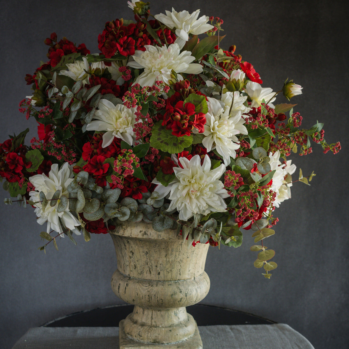 34-inch Anemone spray in white plastic with polyester petals arranged in a naturalistic silhouette.