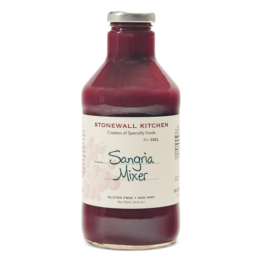 A 24oz glass bottle of Stonewall Kitchen Sangria Mixer with a white label and dark red liquid.