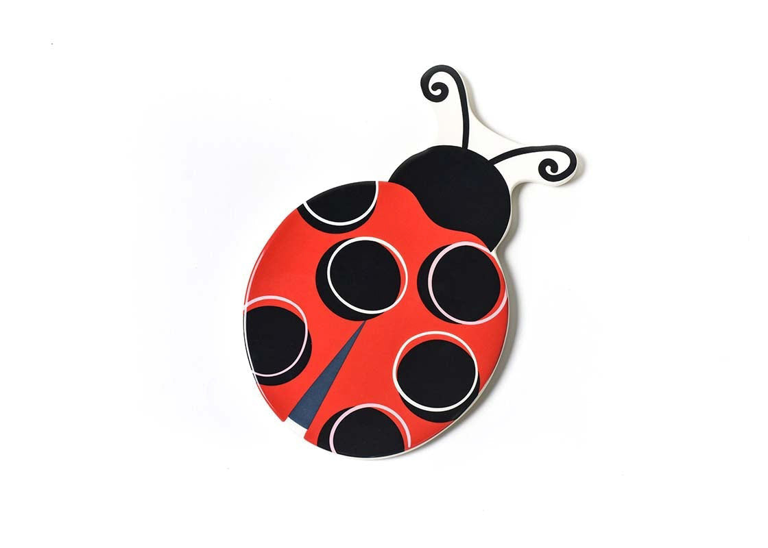 Ceramic ladybug decoration with red body, black dots, white outlines, curly antennae, and hook-and-loop backing.