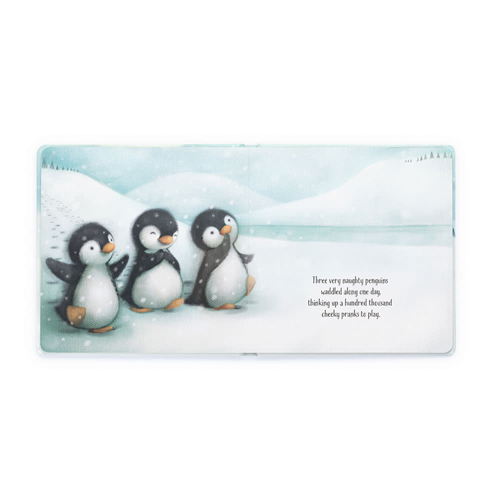 Hardcover children's book 'The Naughty Penguins Book' featuring polar bear illustrations on a white cover.
