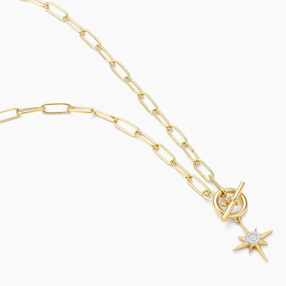 Diamond North Star pendant necklace on a silver chain with celestial star motif.