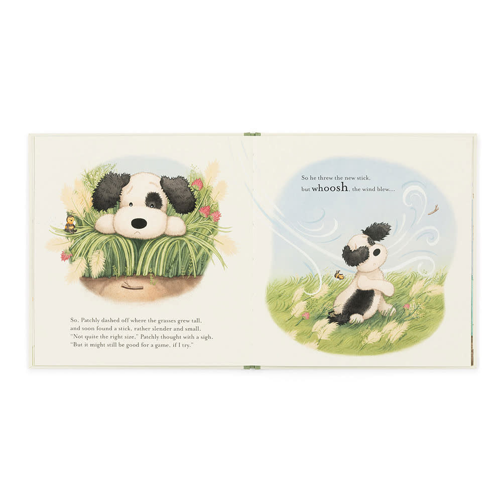 Paper board book cover featuring Bashful Black & Cream puppy seeking a stick toy with friends.