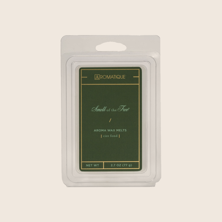White paraffin wax aroma melts tray containing eight pine-scented cubes with cedar and fir notes.
