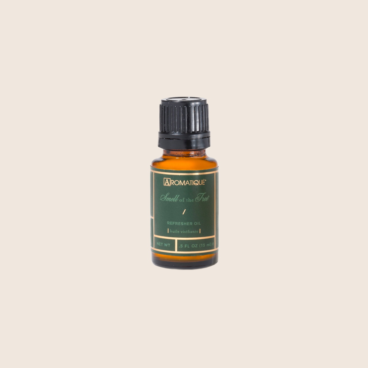 The Smell of Tree Refresher Oil bottle with pine, cedarleaf, fir balsam, bayleaf, clove, and moss fragrance notes.