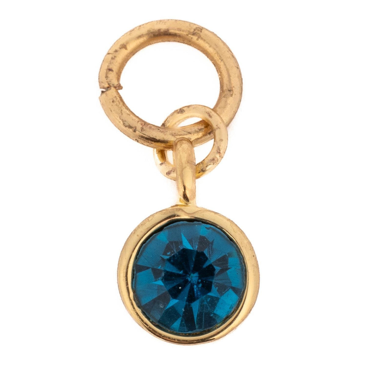 Silver-tone Thea Charm birthstone necklace featuring a December blue topaz stone in an oval setting.