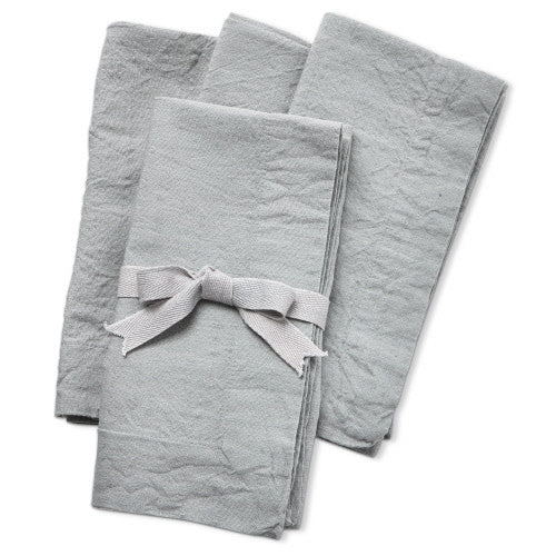 Set of gray slub napkins with a textured fabric finish.