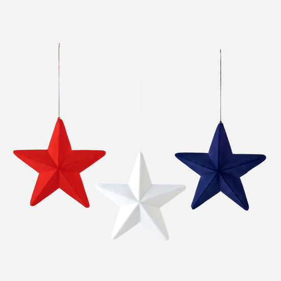 Flocked hanging star ornament with faceted PVC construction in a celestial silver finish.
