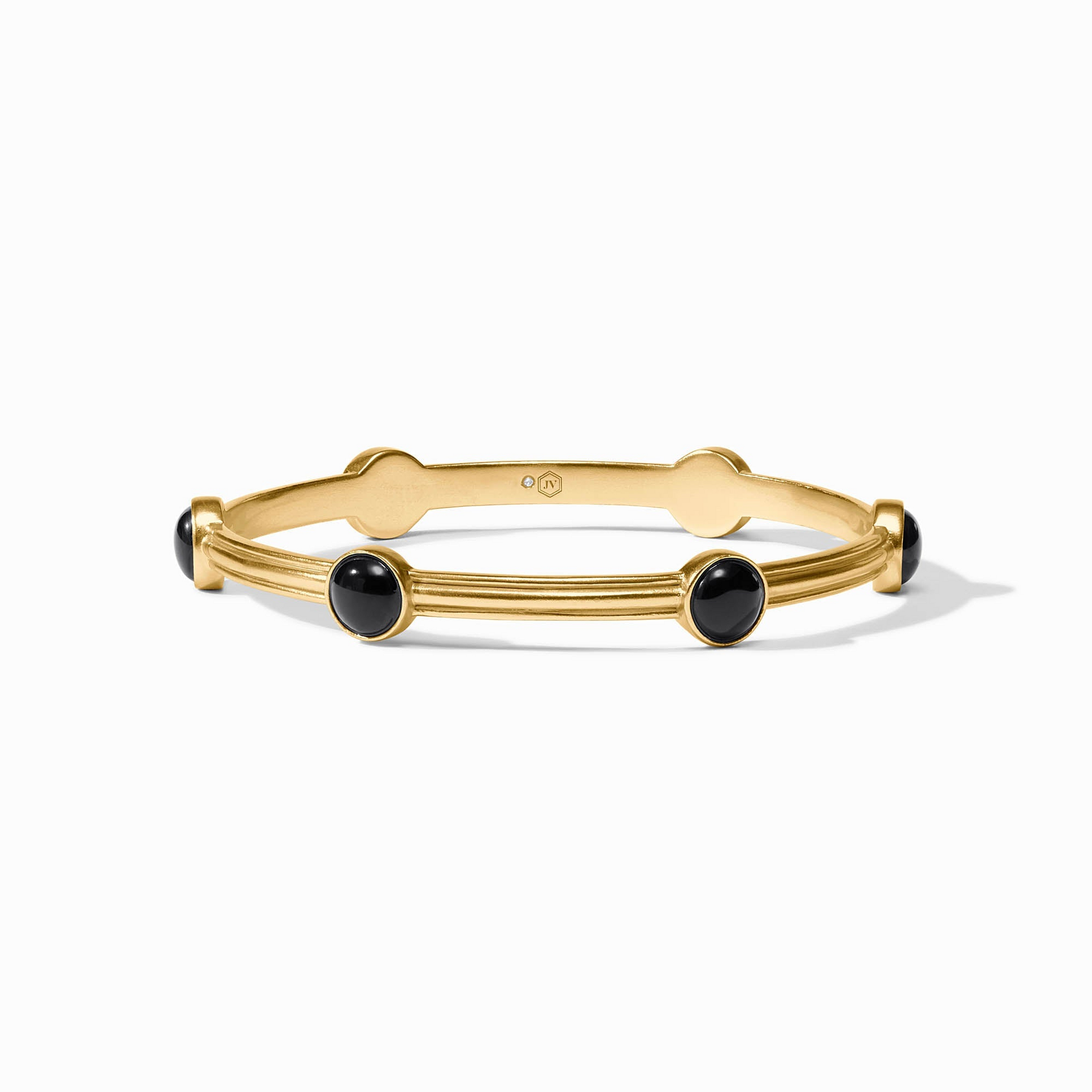 Gold Essex Stone Bangle featuring four round black cabochon stones set in a ridged band.