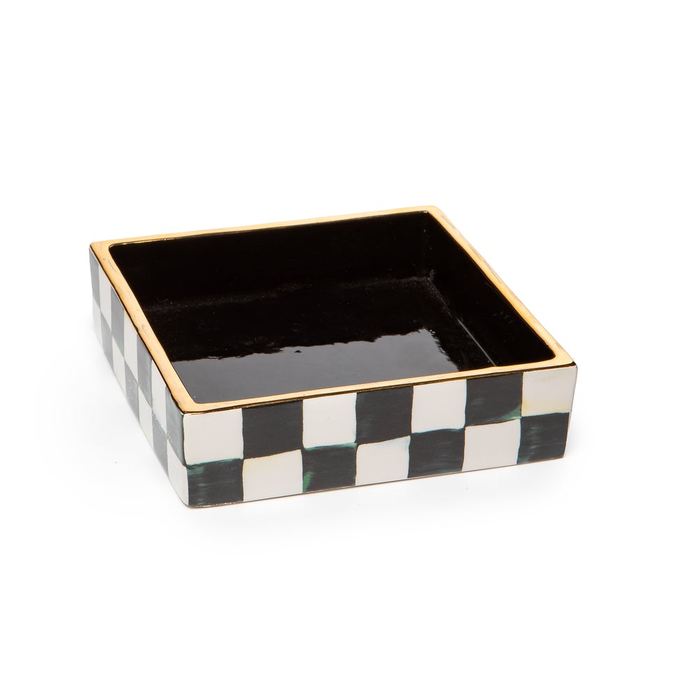 Ceramic cocktail napkin holder with a courtly check blue and white pattern.