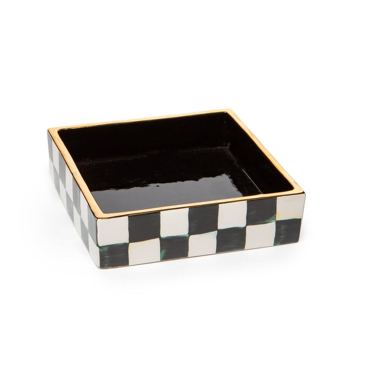 Ceramic cocktail napkin holder with a courtly check blue and white pattern.