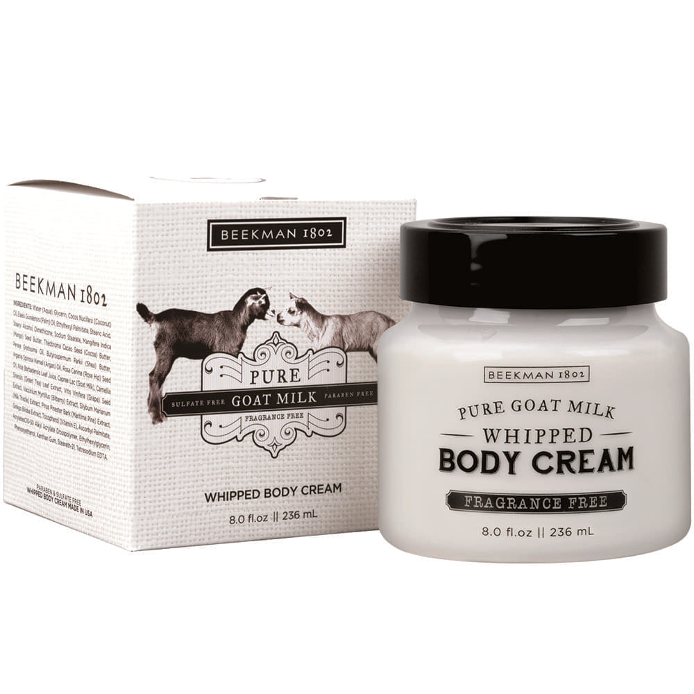 Beekman 1802 Pure Goat Milk Whipped Body Cream in an 8 oz jar next to its product box.
