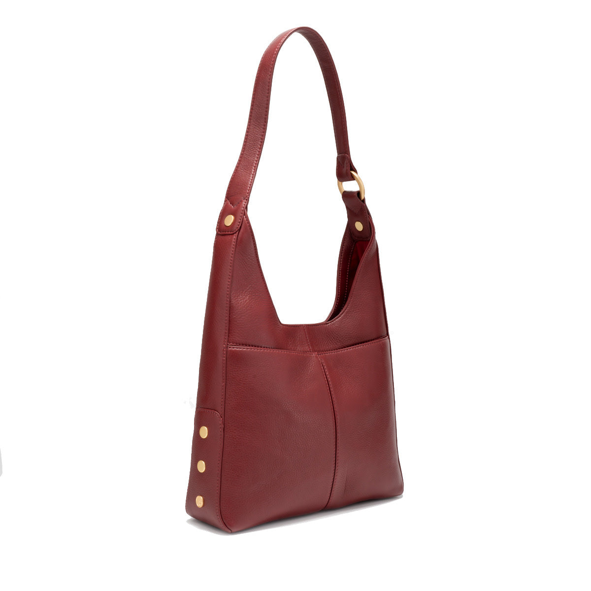 Medium shoulder bag in cherrywood pebble leather with brushed gold hardware, magnetic closure, back pocket, and red lining.
